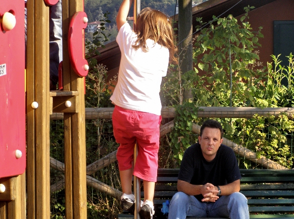 Dad and daughter on playground